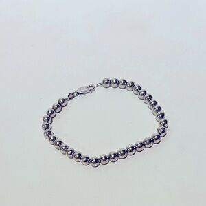 Small bead silver bracelet